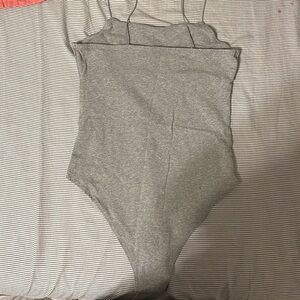 grey body suit